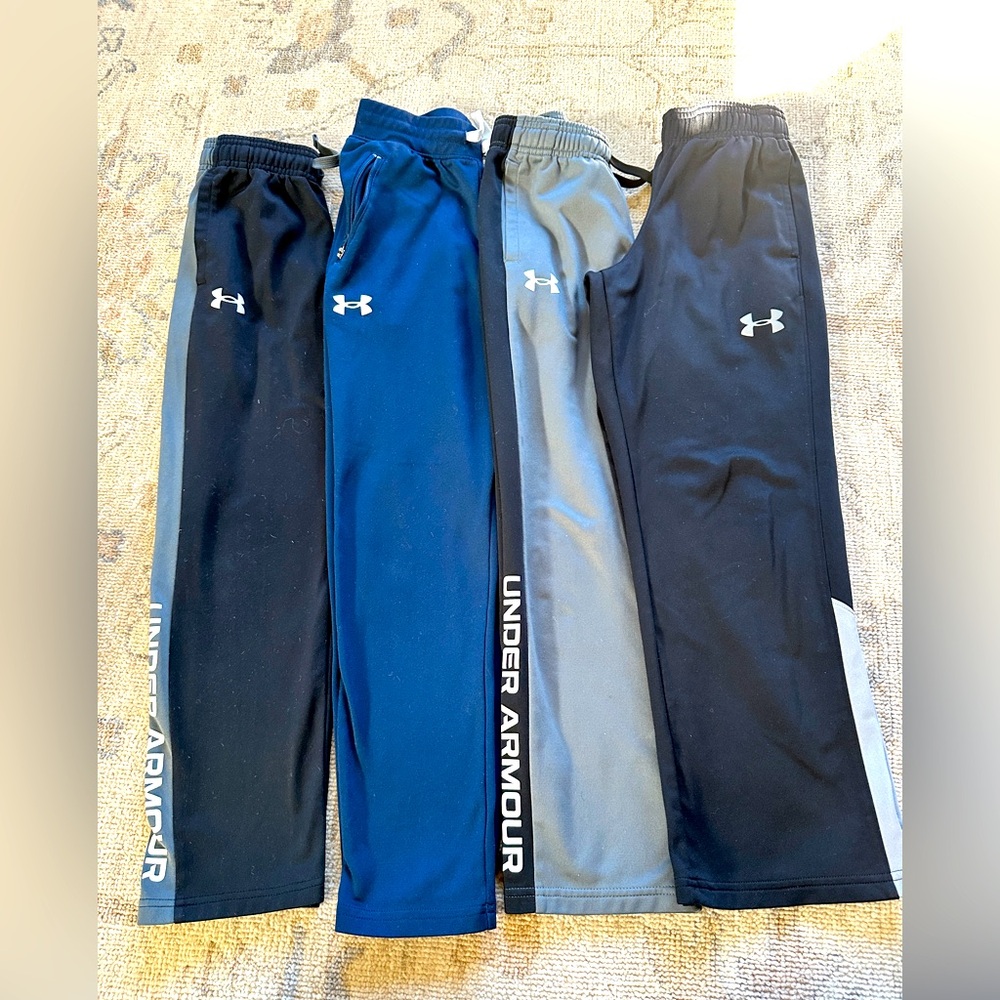 Lot of 4 pairs of Under Armour Boys pants size Small / Medium